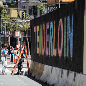 Our mural from the side, showing the word "TENDERLOIN" in colorful handpainted letters
