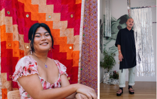 Gericault De La Rose, Tethered, 2024. Installation view from A Soft Place to Land at SOMArts. Courtesy of the artist and SOMArts. An installation photo of a weaving by artist Gericault De La Rose. The weaving shows 19 different hands from people of different races and walks of life encircling a glowing gold heart with small cherub wings. The heart levitates inside a glowing, clear bubble. The weaving is centered on a lilac wall and lit by a spotlight from above, creating an oval halo around the vertically oriented rectangular weaving. To the left is a navy blue velvet curtain, and to the right is a light pink wall. The floor is a rough concrete.